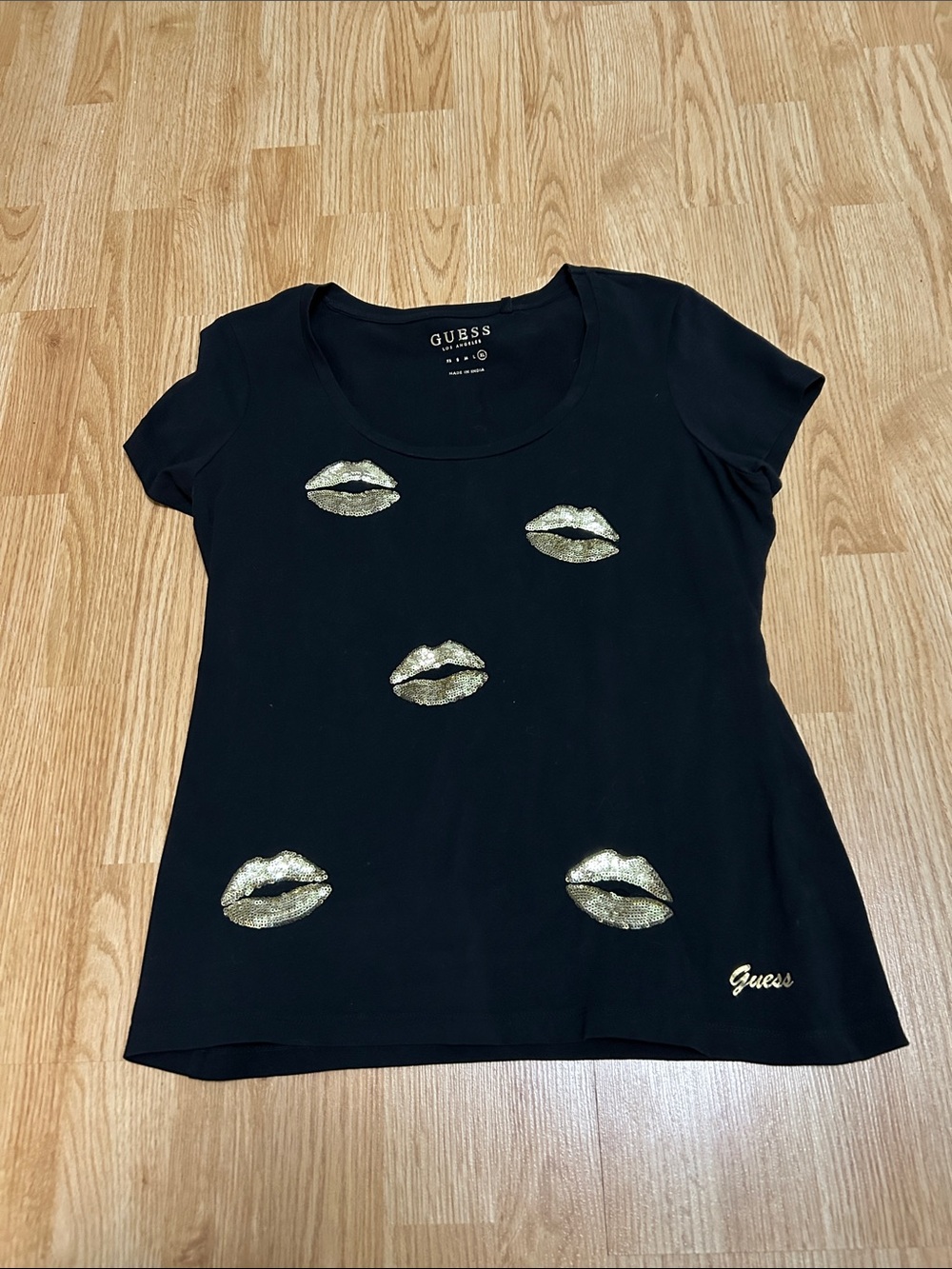 GUESS Black Short Sleeve Tee with Gold Lip Sequin Accents